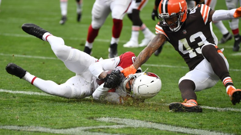 Oct 17, 2021; Cleveland, Ohio, USA; Arizona Cardinals wide receiver DeAndre Hopkins (10) catches a touchdown pass as Cleveland Browns free safety John Johnson (43) defends during the first half at FirstEnergy Stadium. Mandatory Credit: Ken Blaze-USA TODAY Sports