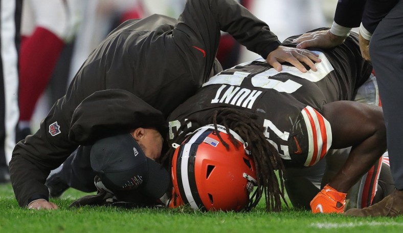 Cleveland Browns running back Kareem Hunt (27) is met by staff members after sustaining an injury during the second half of an NFL football game at FirstEnergy Stadium, Sunday, Oct. 17, 2021, in Cleveland, Ohio. [Jeff Lange/Beacon Journal]

Browns 7