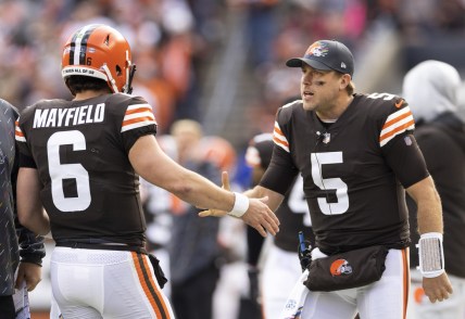 Oct 17, 2021; Cleveland, Ohio, USA; Cleveland Browns quarterback Case Keenum (5) congratulates quarterback Baker Mayfield (6) on the touchdown against the Arizona Cardinals during the second quarter at FirstEnergy Stadium. Mandatory Credit: Scott Galvin-USA TODAY Sports