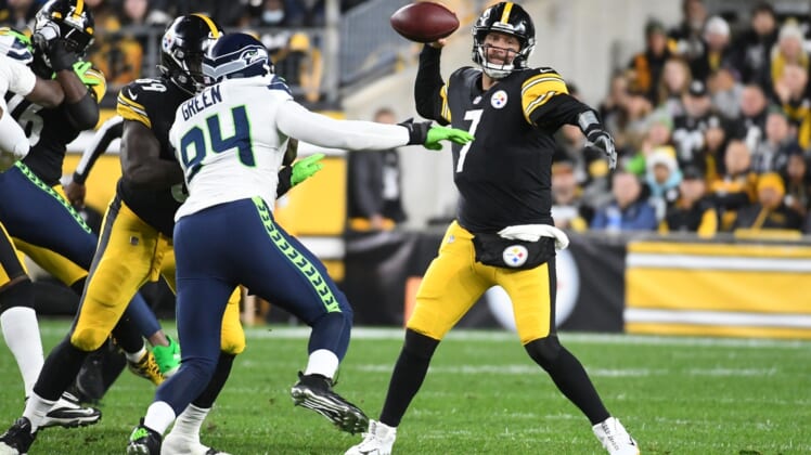 Oct 17, 2021; Pittsburgh, Pennsylvania, USA;  Pittsburgh Steelers quarterback Ben Roethlisberger (7) is pressured by Seattle Seahawks defensive end Rasheem Green (94) during the first quarter at Heinz Field. Mandatory Credit: Philip G. Pavely-USA TODAY Sports