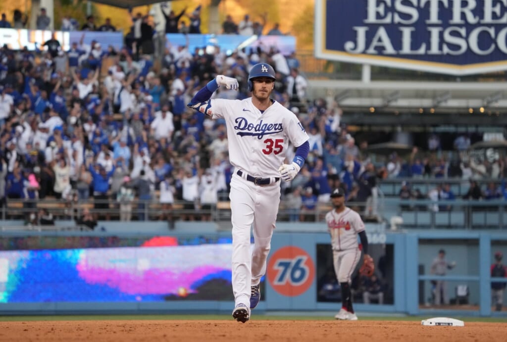 Oct 19, 2021; Los Angeles, California, USA; Los Angeles Dodgers first baseman Cody Bellinger (35) celebrates after hitting a three-run home run in the eighth inning of game three of the 2021 NLCS against the Atlanta Braves at Dodger Stadium. Mandatory Credit: Kirby Lee-USA TODAY Sports
