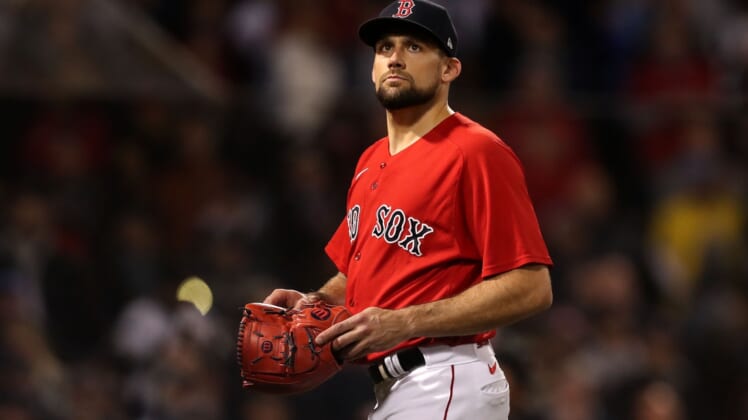 Oct 19, 2021; Boston, Massachusetts, USA; Boston Red Sox starting pitcher Nathan Eovaldi (17) walks off of the field during the ninth inning of game four of the 2021 ALCS against the Houston Astros at Fenway Park. Mandatory Credit: Paul Rutherford-USA TODAY Sports