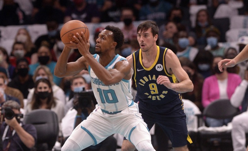 Oct 20, 2021; Charlotte, North Carolina, USA; Charlotte Hornets guard Ish Smith (10) looks to pass during the first half against the Indiana Pacers at the Spectrum Center. Mandatory Credit: Sam Sharpe-USA TODAY Sports