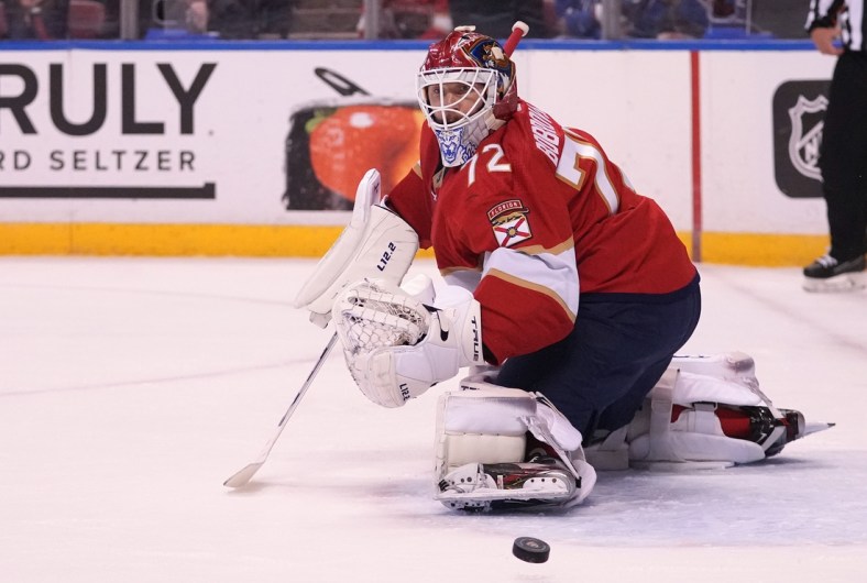 Oct 21, 2021; Sunrise, Florida, USA; Florida Panthers goaltender Sergei Bobrovsky (72) deflects a shot against the Colorado Avalanche during the first period at FLA Live Arena. Mandatory Credit: Jasen Vinlove-USA TODAY Sports