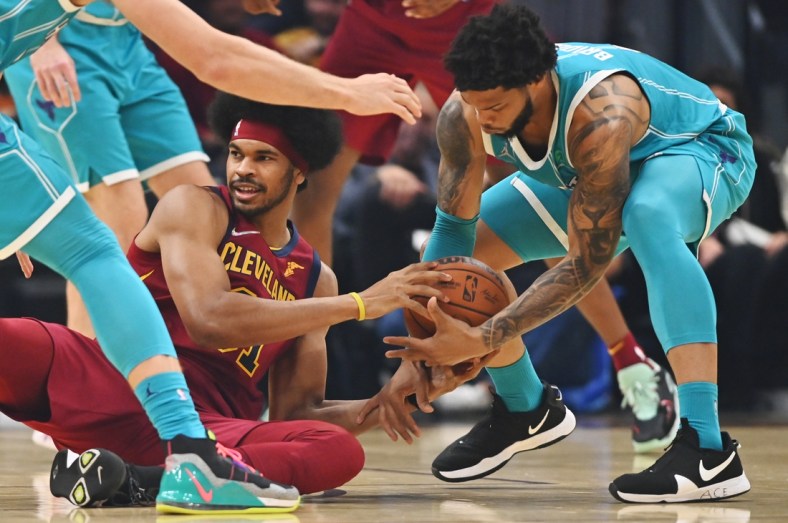 Oct 22, 2021; Cleveland, Ohio, USA; Charlotte Hornets forward Miles Bridges (0) and Cleveland Cavaliers center Jarrett Allen (31) go for a loose ball during the first quarter at Rocket Mortgage FieldHouse. Mandatory Credit: Ken Blaze-USA TODAY Sports