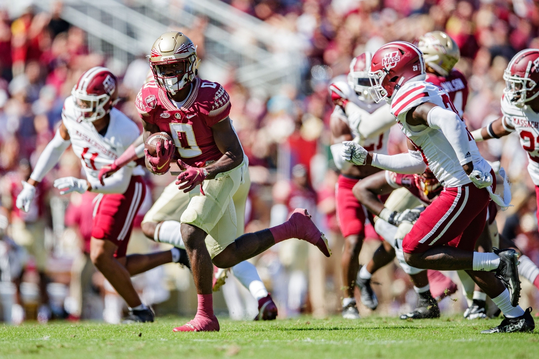 Florida State Seminoles running back Jashaun Corbin (0) looks over his shoulder as he makes his way down the field. The Florida State Seminoles leads the Massachusetts Minutemen 38-3 at the half Saturday, Oct. 23, 2021.

Fsu V Umass1421