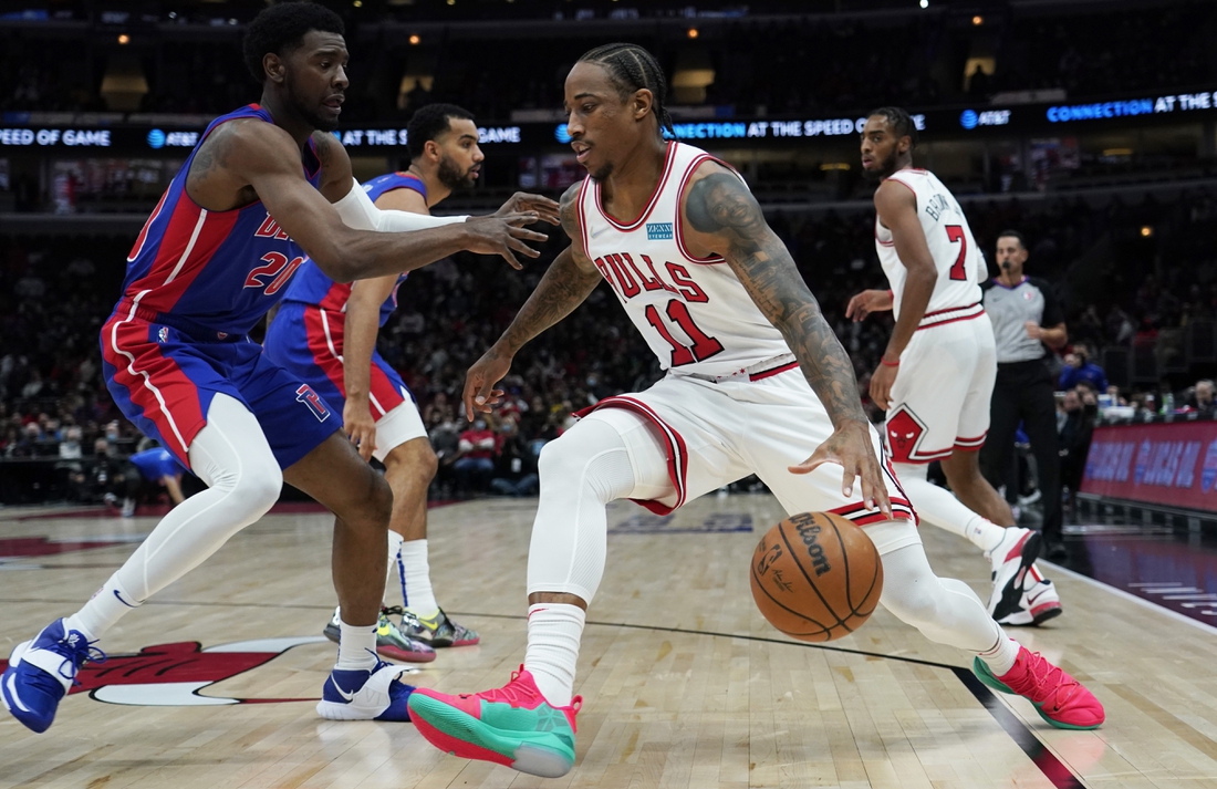 Oct 23, 2021; Chicago, Illinois, USA; Chicago Bulls forward DeMar DeRozan (11) drives on Detroit Pistons guard Josh Jackson (20) during the first half at United Center. Mandatory Credit: David Banks-USA TODAY Sports