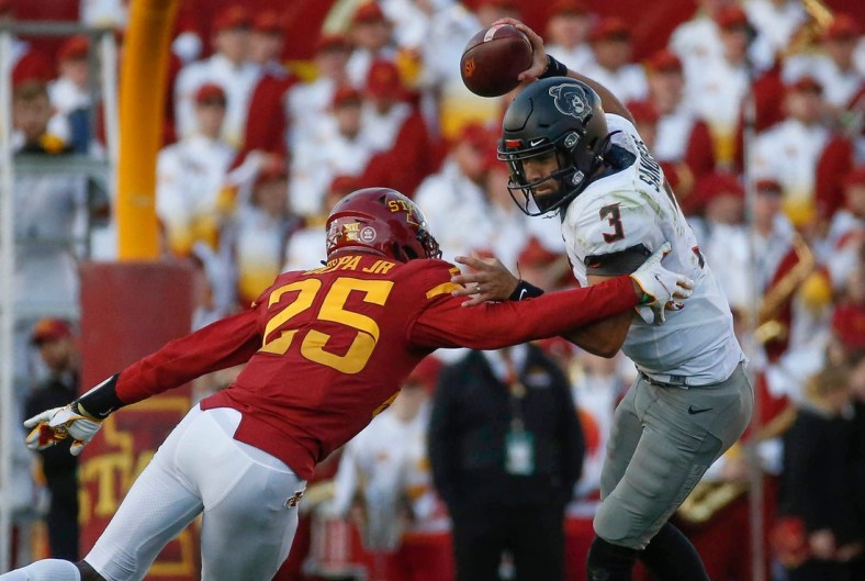 Iowa State sophomore defensive back T.J. Tampa Jr., hits Oklahoma State quarterback Spencer Sanders in the third quarter on Saturday, Oct. 23, 2021, at Jack Trice Stadium in Ames.

20211023 Iowastatevsokst