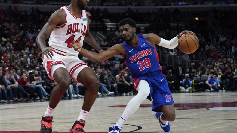 Oct 23, 2021; Chicago, Illinois, USA; Detroit Pistons guard Josh Jackson (20) drives against Chicago Bulls forward Patrick Williams (44) during the second half at United Center. Mandatory Credit: David Banks-USA TODAY Sports