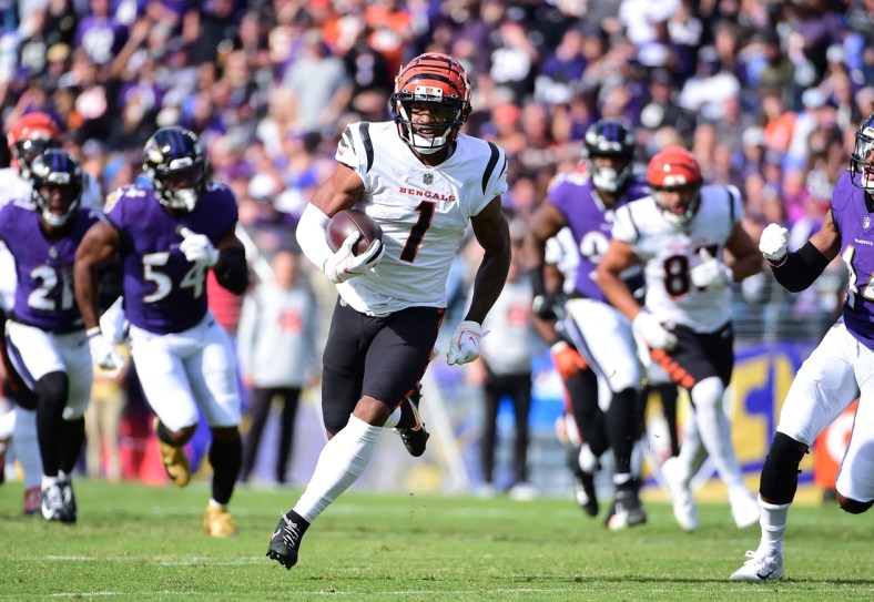 Oct 24, 2021; Baltimore, Maryland, USA; Cincinnati Bengals wide receiver Ja Marr Chase (1) runs with the ball in the second quarter against the Baltimore Ravens at M&T Bank Stadium. Mandatory Credit: Evan Habeeb-USA TODAY Sports