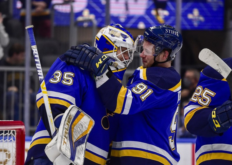Oct 25, 2021; St. Louis, Missouri, USA;  St. Louis Blues right wing Vladimir Tarasenko (91) celebrates with goaltender Ville Husso (35) after the Blues defeated the Los Angeles Kings at Enterprise Center. Mandatory Credit: Jeff Curry-USA TODAY Sports