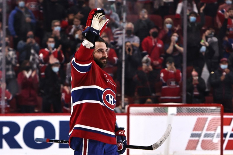 Oct 23, 2021; Montreal, Quebec, CAN; Montreal Canadiens left wing Mathieu Perreault (85) waves to the crowd as he is named first star of the game against Detroit Red Wings at Bell Centre. Mandatory Credit: Jean-Yves Ahern-USA TODAY Sports