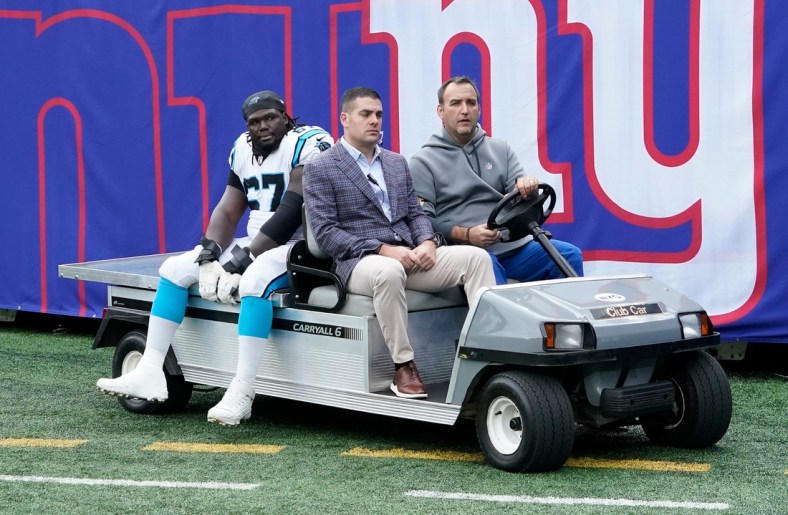 Oct 24, 2021; East Rutherford, NJ, USA; Carolina Panthers guard John Miller (67) is carted off the field after being injured at MetLife Stadium. Mandatory Credit: Robert Deutsch-USA TODAY Sports