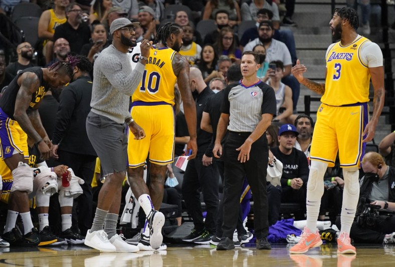 Oct 26, 2021; San Antonio, Texas, USA; Los Angeles Lakers forward LeBron James (6) talks to forward Anthony Davis (3) from the bench in the first half of the game against the San Antonio Spurs at AT&T Center. Mandatory Credit: Scott Wachter-USA TODAY Sports