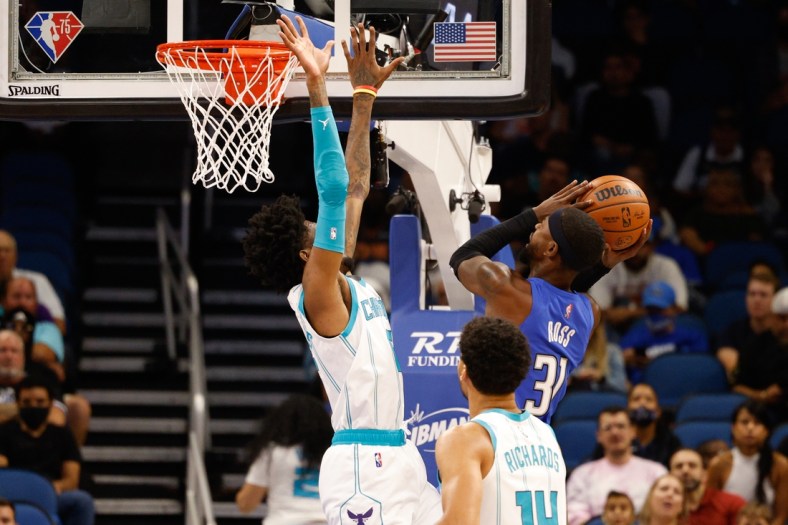 Oct 27, 2021; Orlando, Florida, USA;  Orlando Magic guard Terrence Ross (31) shoots the ball in the first half against the Charlotte Hornets at Amway Center. Mandatory Credit: Nathan Ray Seebeck-USA TODAY Sports