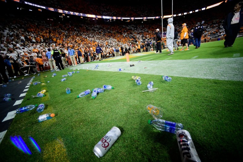 Trash litters the sidelines during an SEC football game between Tennessee and Ole Miss at Neyland Stadium in Knoxville, Tenn. on Saturday, Oct. 16, 2021. Tennessee fans threw debris onto the field in objection to a ruling on a play in the end of the fourth quarter.

Kns Tennessee Ole Miss Football