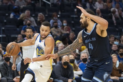 October 28, 2021; San Francisco, California, USA; Golden State Warriors guard Stephen Curry (30) dribbles the basketball against Memphis Grizzlies center Steven Adams (4) during the second quarter at Chase Center. Mandatory Credit: Kyle Terada-USA TODAY Sports