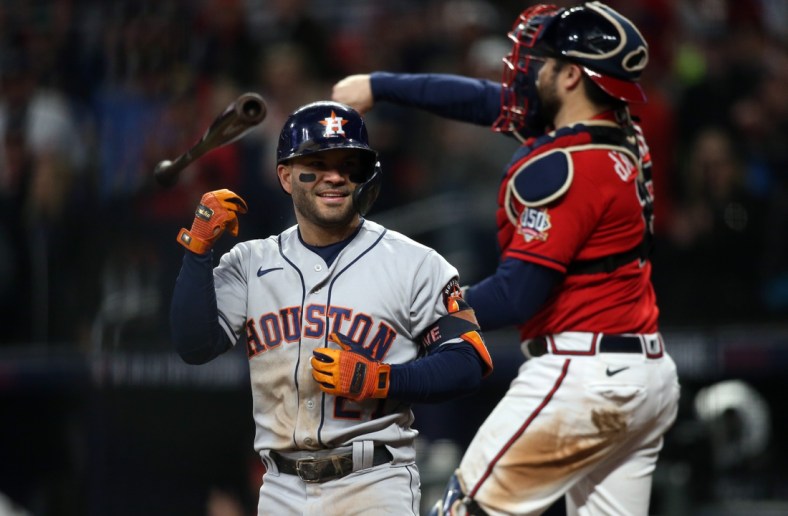 Oct 29, 2021; Atlanta, Georgia, USA; Houston Astros second baseman Jose Altuve (27) reacts to striking out against the Atlanta Braves during the third inning during game three of the 2021 World Series at Truist Park. Mandatory Credit: Brett Davis-USA TODAY Sports