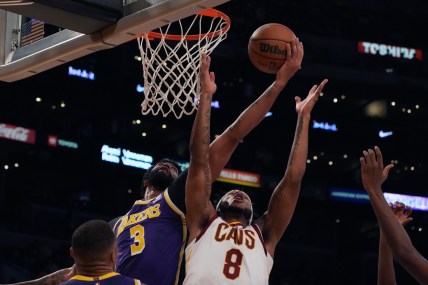 Oct 29, 2021; Los Angeles, California, USA; Los Angeles Lakers forward Anthony Davis (3) defends against Cleveland Cavaliers forward Lamar Stevens (8) during the first half at Staples Center. Mandatory Credit: Kirby Lee-USA TODAY Sports