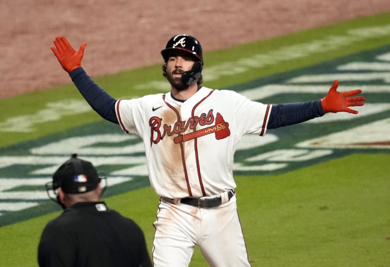 Oct 30, 2021; Atlanta, Georgia, USA; Atlanta Braves shortstop Dansby Swanson (7) celebrates a home run against the Houston Astros during the seventh inningof game four of the 2021 World Series at Truist Park. Mandatory Credit: Dale Zanine-USA TODAY Sports