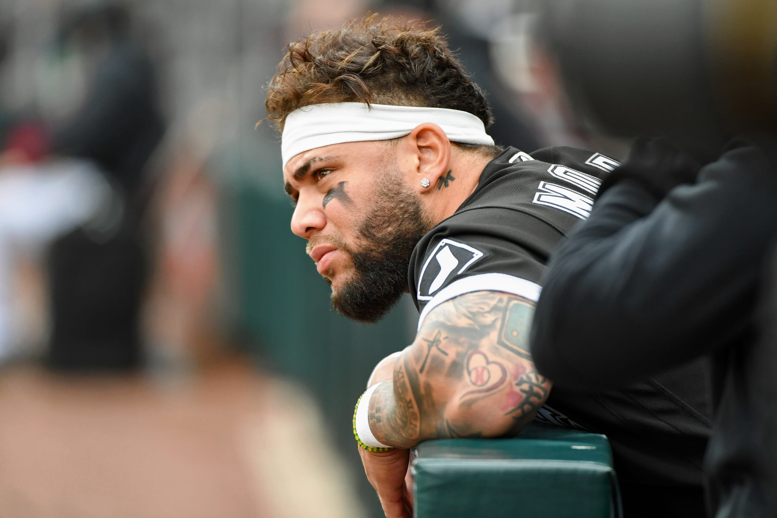 A tattoo is seen on Chicago White Sox Yoan Moncada's neck during