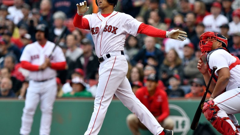 May 27, 2018; Boston, MA, USA; Boston Red Sox Alumni Julio Lugo watches the ball after hitting a home run during an Alumni Game at Fenway Park. Mandatory Credit: Brian Fluharty-USA TODAY Sports