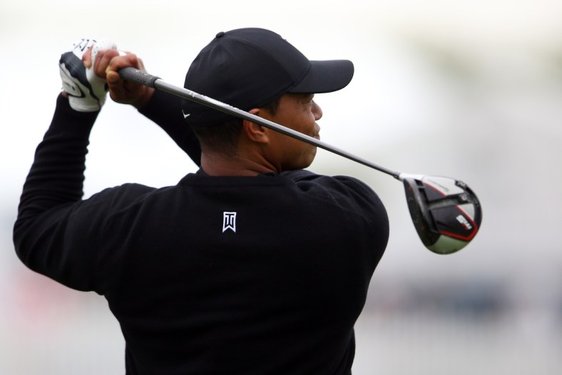 May 14, 2019; Farmingdale, NY, USA; Tiger Woods practices on the driving range for the PGA Championship golf tournament at Bethpage State Park - Black Course. Mandatory Credit: Peter Casey-USA TODAY Sports