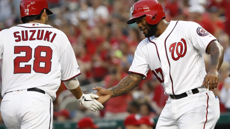 Jun 20, 2019; Washington, DC, USA; Washington Nationals catcher Kurt Suzuki (28) celebrates with Nationals second baseman Howie Kendrick (47) after hitting a two run home run against the Philadelphia Phillies in the second inning at Nationals Park. Mandatory Credit: Geoff Burke-USA TODAY Sports
