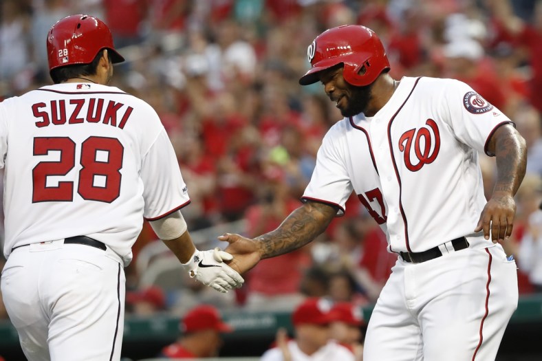 Jun 20, 2019; Washington, DC, USA; Washington Nationals catcher Kurt Suzuki (28) celebrates with Nationals second baseman Howie Kendrick (47) after hitting a two run home run against the Philadelphia Phillies in the second inning at Nationals Park. Mandatory Credit: Geoff Burke-USA TODAY Sports