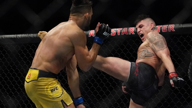 Feb 15, 2020; Rio Rancho, New Mexico, USA; Diego Sanchez (red) fights Michel Pereira (blue) in the welterweight bout during UFC Fight Night at Santa Ana Star Arena. Mandatory Credit: Kirby Lee-USA TODAY Sports