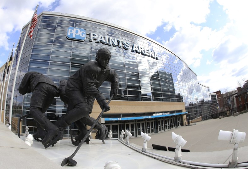 Mar 15, 2020; Pittsburgh, Pennsylvania, USA;  General exterior view of the Mario Lemieux statue outside the PPG PAINTS Arena as the NHL game scheduled between the Pittsburgh Penguins and the New York Islanders was suspended due to COVID-19 coronavirus concerns.  Mandatory Credit: Charles LeClaire-USA TODAY Sports