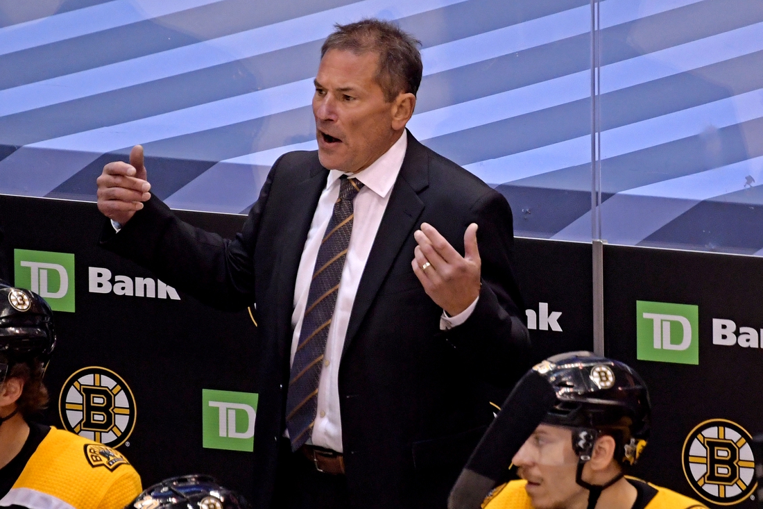 Aug 26, 2020; Toronto, Ontario, CAN; Boston Bruins head coach Bruce Cassidy reacts on the bench during the third period against the Tampa Bay Lightning in game three of the second round of the 2020 Stanley Cup Playoffs at Scotiabank Arena. Mandatory Credit: Dan Hamilton-USA TODAY Sports