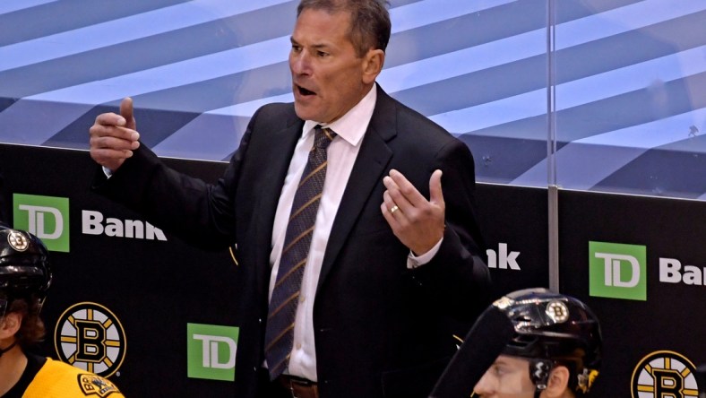 Aug 26, 2020; Toronto, Ontario, CAN; Boston Bruins head coach Bruce Cassidy reacts on the bench during the third period against the Tampa Bay Lightning in game three of the second round of the 2020 Stanley Cup Playoffs at Scotiabank Arena. Mandatory Credit: Dan Hamilton-USA TODAY Sports