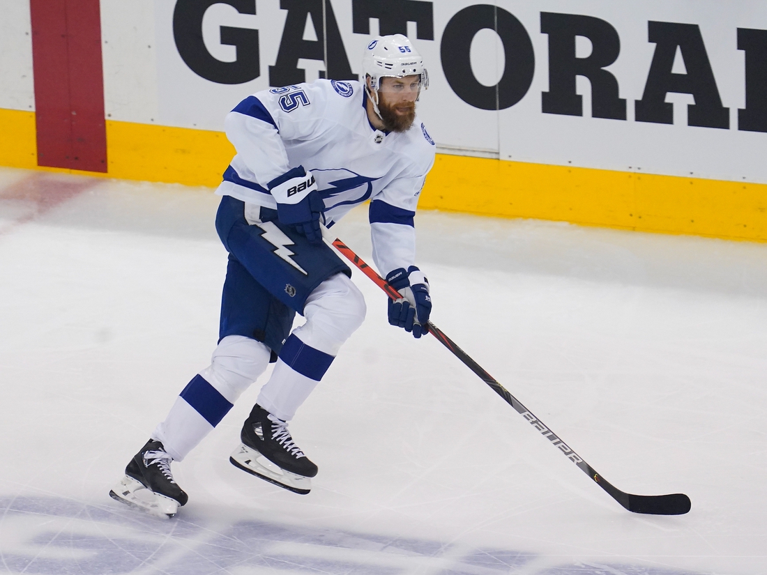 Aug 29, 2020; Toronto, Ontario, CAN; Tampa Bay Lightning defenseman Braydon Coburn (55) carries the puck against teh Boston Bruins in game four of the second round of the 2020 Stanley Cup Playoffs at Scotiabank Arena. Mandatory Credit: John E. Sokolowski-USA TODAY Sports