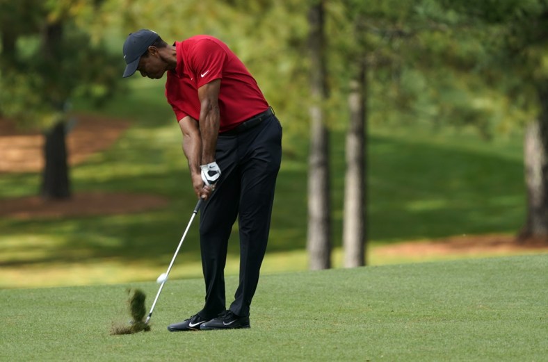 File photo: Tiger Woods plays his shot from the 17th fairway during the final round of The Masters golf tournament at Augusta National GC. Mandatory Credit: Michael Madrid-USA TODAY Sports