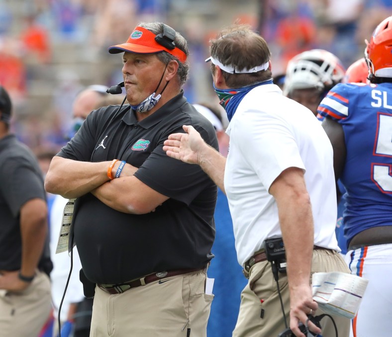 Nov 28, 2020; Gainesville, FL, USA;  Florida Gators head coach Dan Mullen yells at defensive coordinator Todd Grantham during a football game against the Kentucky Wildcats at Ben Hill Griffin Stadium in Gainesville, Fla. Nov. 28, 2020.  Mandatory Credit: Brad McClenny-USA TODAY NETWORK