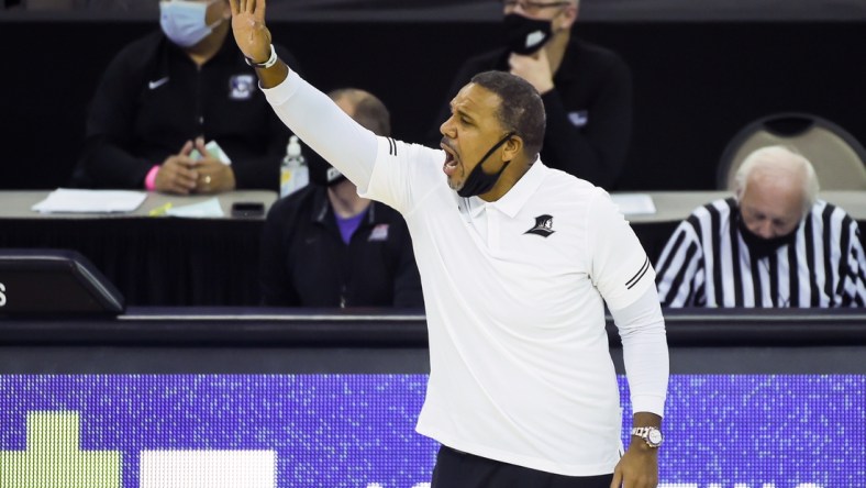 Jan 20, 2021; Omaha, Nebraska, USA;  Providence Friars head coach Ed Cooley signals his team during the game against the Creighton Bluejays in the first half at CHI Health Center Omaha. Mandatory Credit: Steven Branscombe-USA TODAY Sports