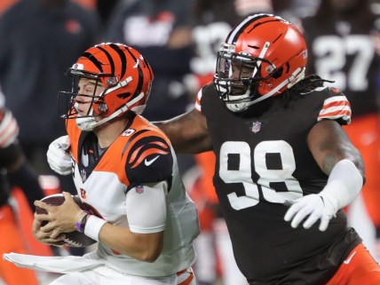 Cleveland Browns defensive tackle Sheldon Richardson (98) sacks Cincinnati Bengals quarterback Joe Burrow (9) during the first half of an NFL football game at FirstEnergy Stadium, Thursday, Sept. 17, 2020, in Cleveland, Ohio. [Jeff Lange/Beacon Journal]

Browns 23