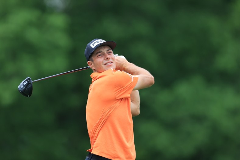 Jun 4, 2021; Dublin, Ohio, USA; Viktor Hovland hits his tee shot on the 18th hole during the conclusion of the rain-delayed first round of the Memorial Tournament golf tournament. Mandatory Credit: Aaron Doster-USA TODAY Sports