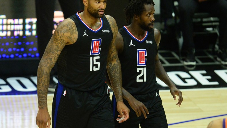 Jun 30, 2021; Los Angeles, California, USA; Los Angeles Clippers center DeMarcus Cousins (15) reacts after a defensive play against the Phoenix Suns during the second half in game six of the Western Conference Finals for the 2021 NBA Playoffs at Staples Center. Mandatory Credit: Gary A. Vasquez-USA TODAY Sports