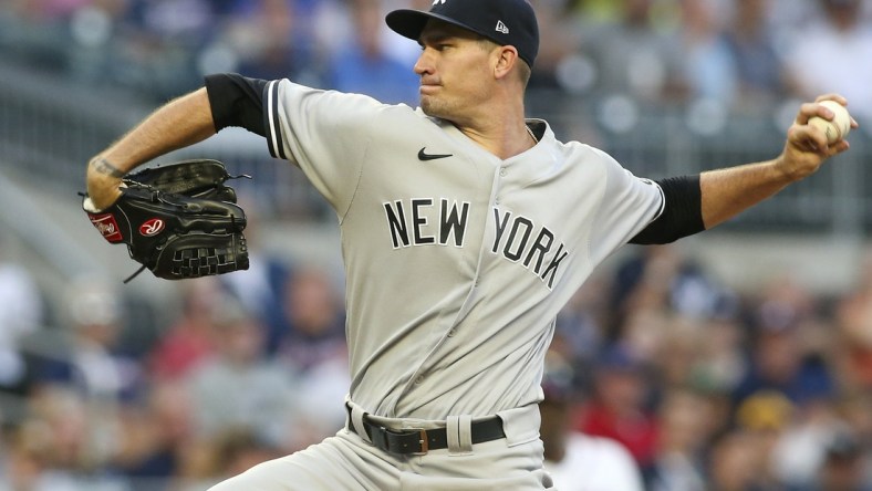 Aug 24, 2021; Atlanta, Georgia, USA; New York Yankees starting pitcher Andrew Heaney (38) throws against the Atlanta Braves in the first inning at Truist Park. Mandatory Credit: Brett Davis-USA TODAY Sports