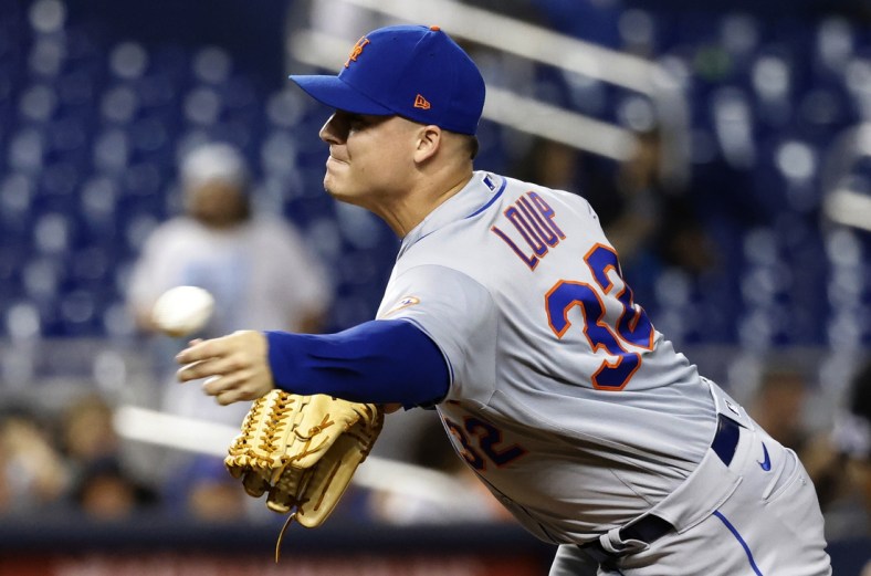 Sep 8, 2021; Miami, Florida, USA;  New York Mets pitcher Aaron Loup (32) pitches against the Miami Marlins during the eighth inning at loanDepot Park Mandatory Credit: Rhona Wise-USA TODAY Sports