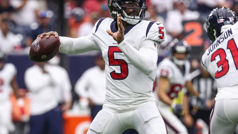 Sep 12, 2021; Houston, Texas, USA; Houston Texans quarterback Tyrod Taylor (5) attempts a pass during the game against the Jacksonville Jaguars at NRG Stadium. Mandatory Credit: Troy Taormina-USA TODAY Sports