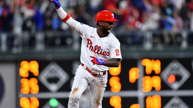 Sep 24, 2021; Philadelphia, Pennsylvania, USA; Philadelphia Phillies left fielder Andrew McCutchen (22) reacts as he rounds the bases after a three-run home run from shortstop Didi Gregorius (not pitctured) in the seventh inning against the Pittsburgh Pirates at Citizens Bank Park. Mandatory Credit: Kyle Ross-USA TODAY Sports