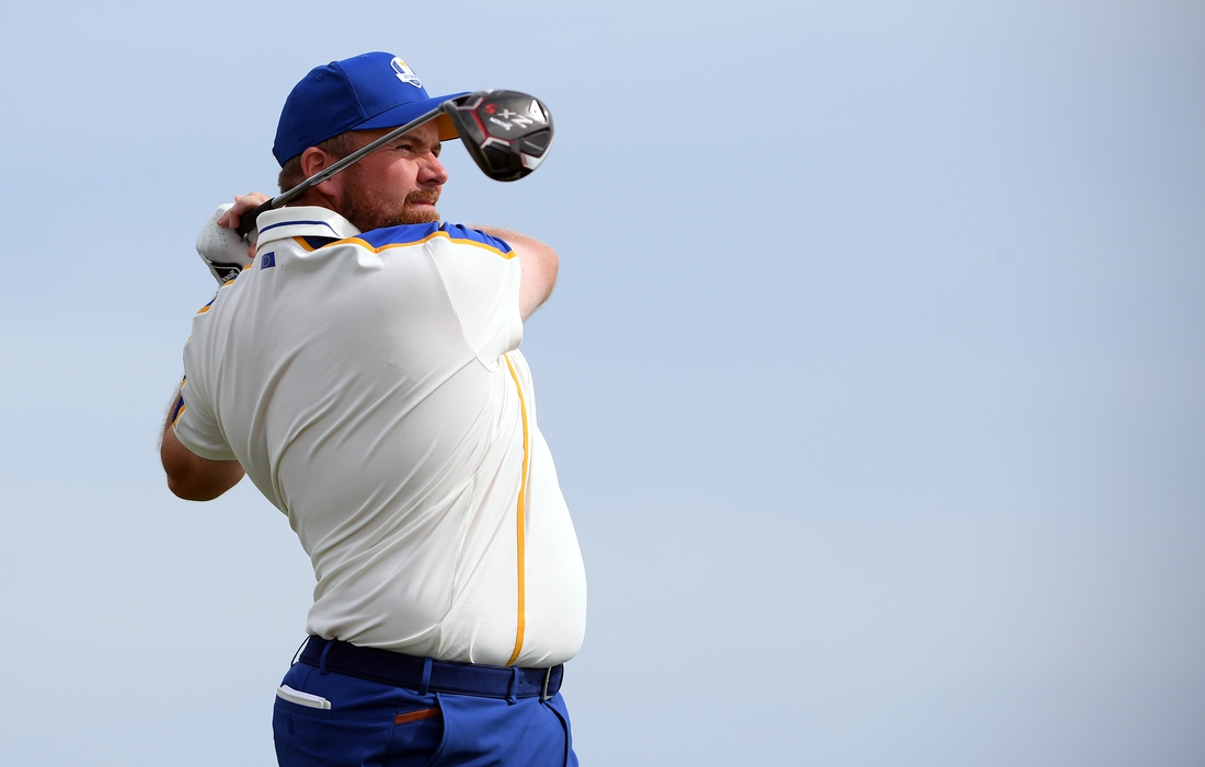 Sep 26, 2021; Haven, Wisconsin, USA; Team Europe player Shane Lowry plays his shot from the fourth tee during day three singles rounds for the 43rd Ryder Cup golf competition at Whistling Straits. Mandatory Credit: Orlando Ramirez-USA TODAY Sports
