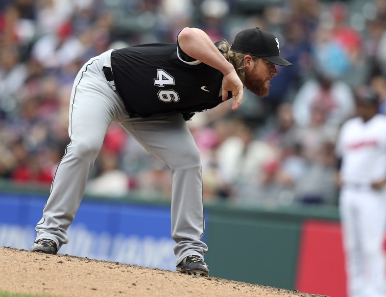 Sep 26, 2021; Cleveland, Ohio, USA;  Chicago White Sox relief pitcher Craig Kimbrel  (46) looks for a sign in the eigth inning against the Cleveland Indians at Progressive Field. Mandatory Credit: Aaron Josefczyk-USA TODAY Sports