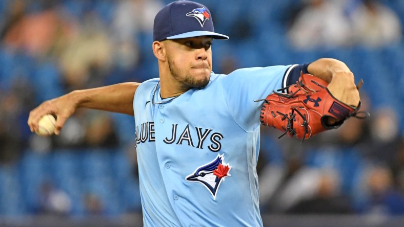 Sep 29, 2021; Toronto, Ontario, CAN; Toronto Blue Jays starting pitcher Jose Berrios (17) throws a pitch against New York Yankees in the first inning at Rogers Centre. Mandatory Credit: Dan Hamilton-USA TODAY Sports