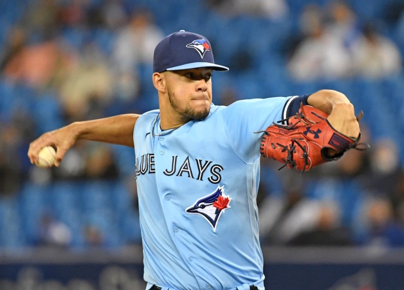 Sep 29, 2021; Toronto, Ontario, CAN; Toronto Blue Jays starting pitcher Jose Berrios (17) throws a pitch against New York Yankees in the first inning at Rogers Centre. Mandatory Credit: Dan Hamilton-USA TODAY Sports