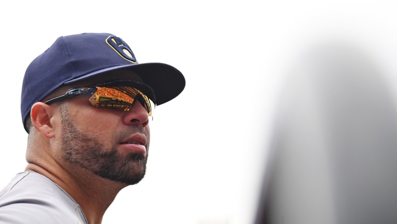 Sep 30, 2021; St. Louis, Missouri, USA;  Milwaukee Brewers catcher Manny Pina (9) looks on before a game against the St. Louis Cardinals at Busch Stadium. Mandatory Credit: Jeff Curry-USA TODAY Sports