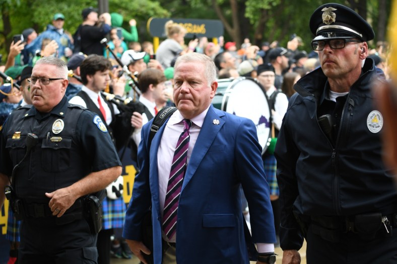 Oct 2, 2021; South Bend, Indiana, USA; Notre Dame Fighting Irish head coach Brian Kelly enters Notre Dame Stadium before the game against the Cincinnati Bearcats. Mandatory Credit: Matt Cashore-USA TODAY Sports